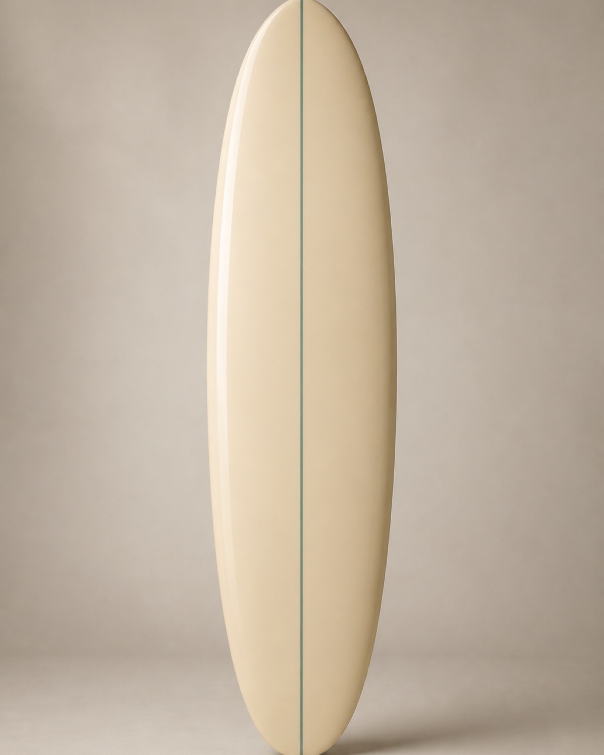 A sand-coloured mid-length funboard with a rounded nose