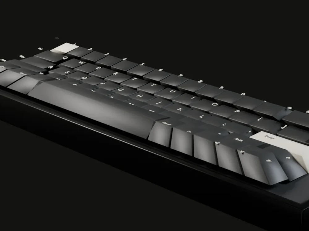 DOWNSTROKE 65 in Carbon, three-quarter view on a dark studio ground