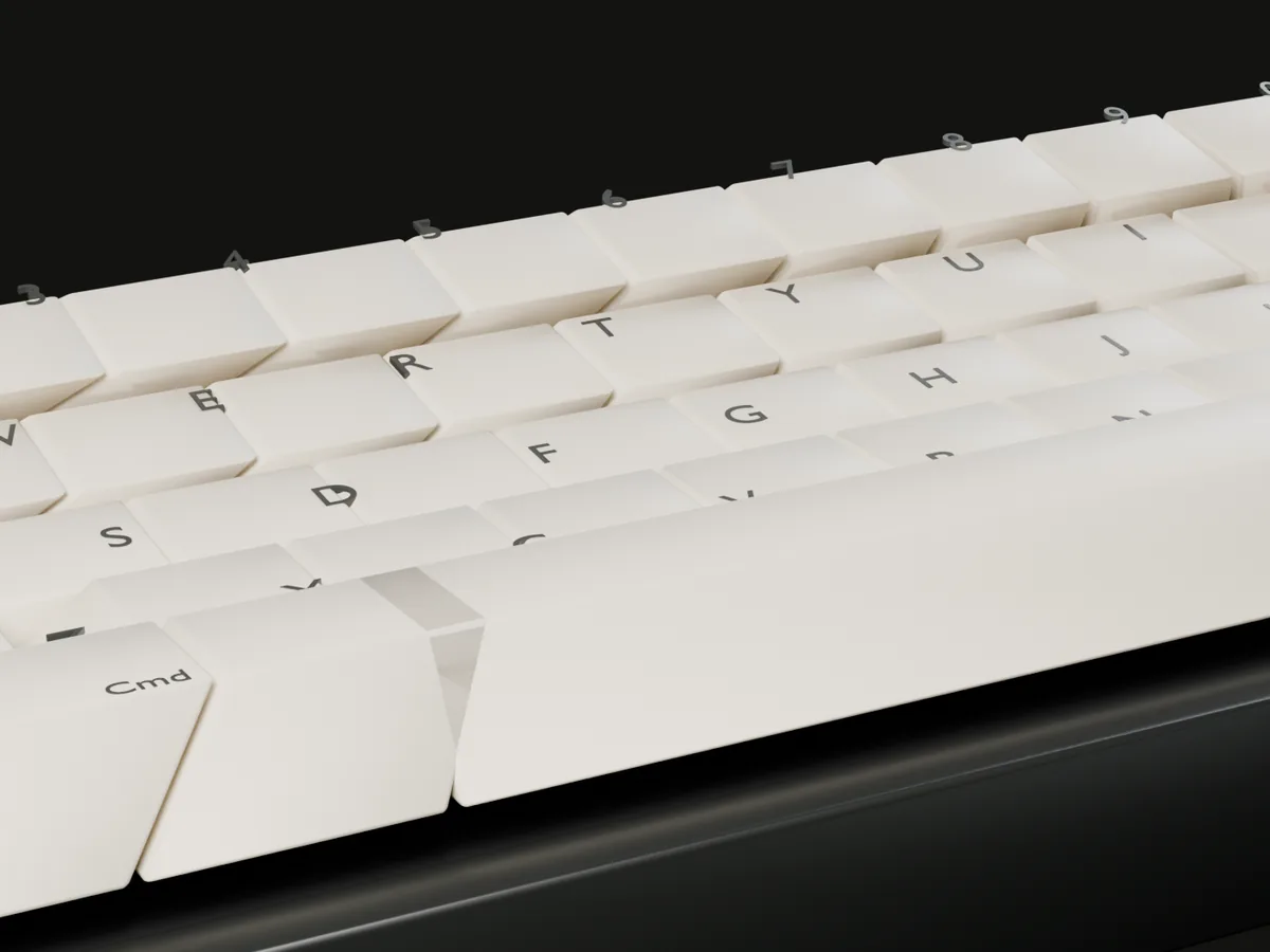 Close view of beige keycaps showing the sculpted rows