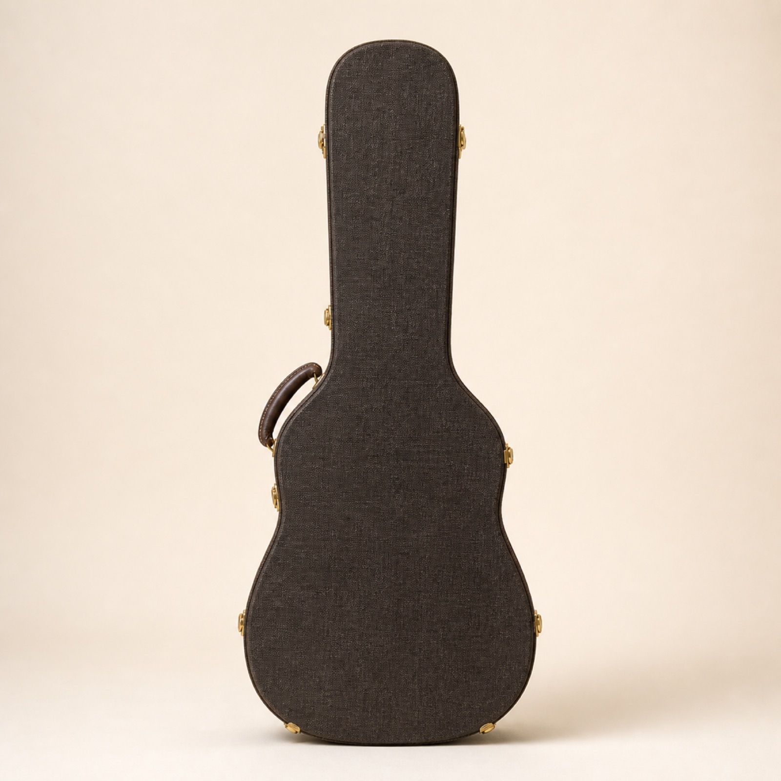 Arched hard guitar flight case in charcoal fabric with brass latches