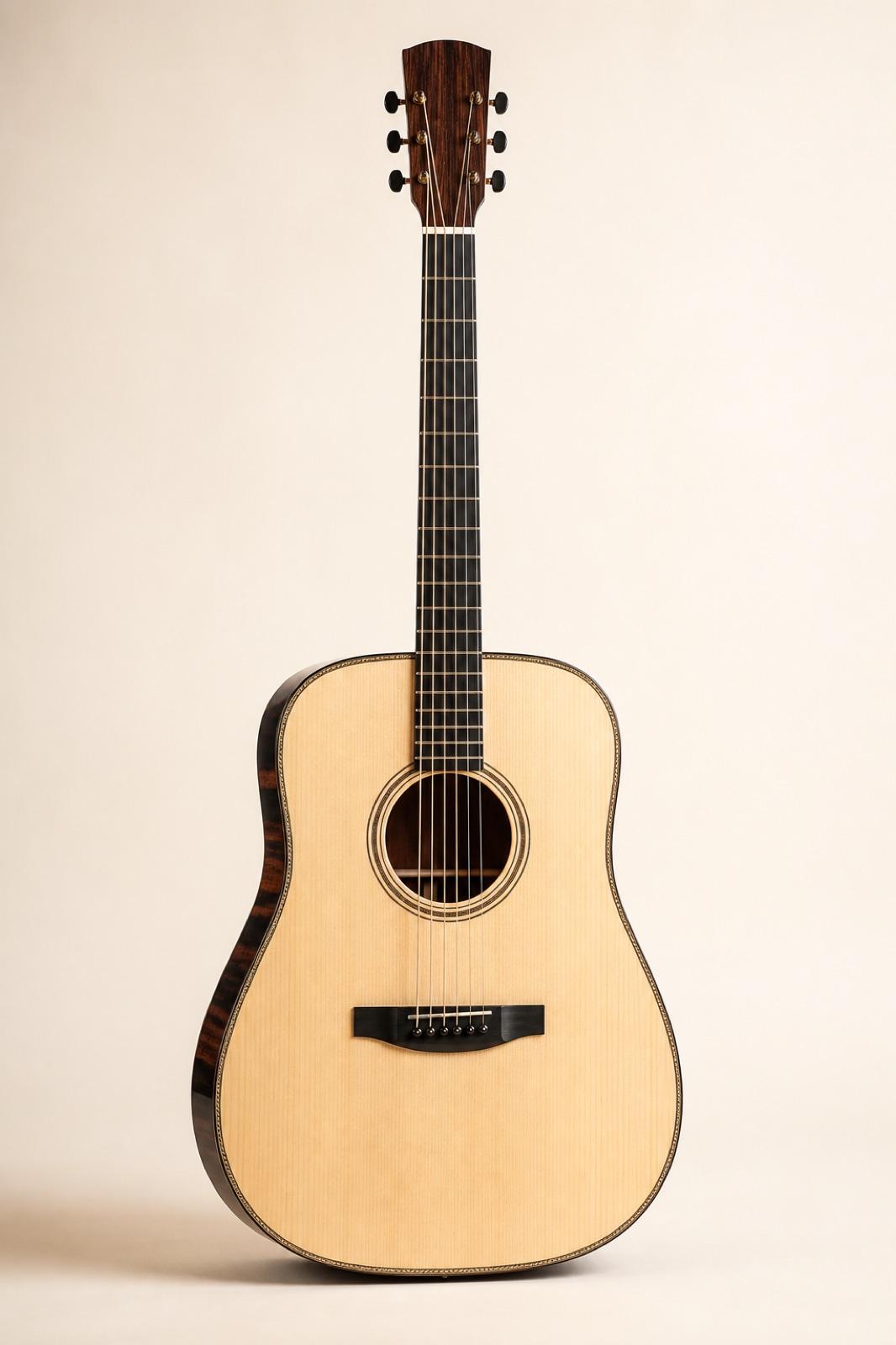 Dreadnought acoustic guitar with a pale spruce top and dark Madagascar rosewood