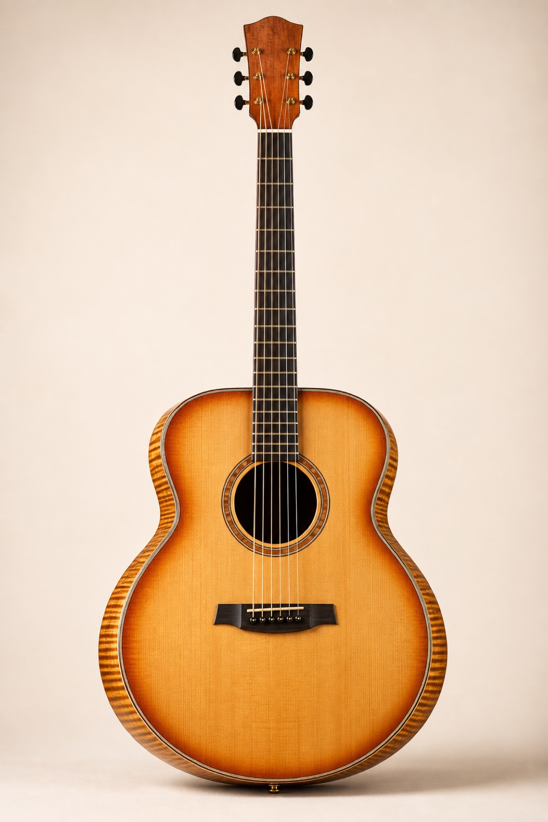 Jumbo acoustic guitar with a flamed maple back and amber sunburst