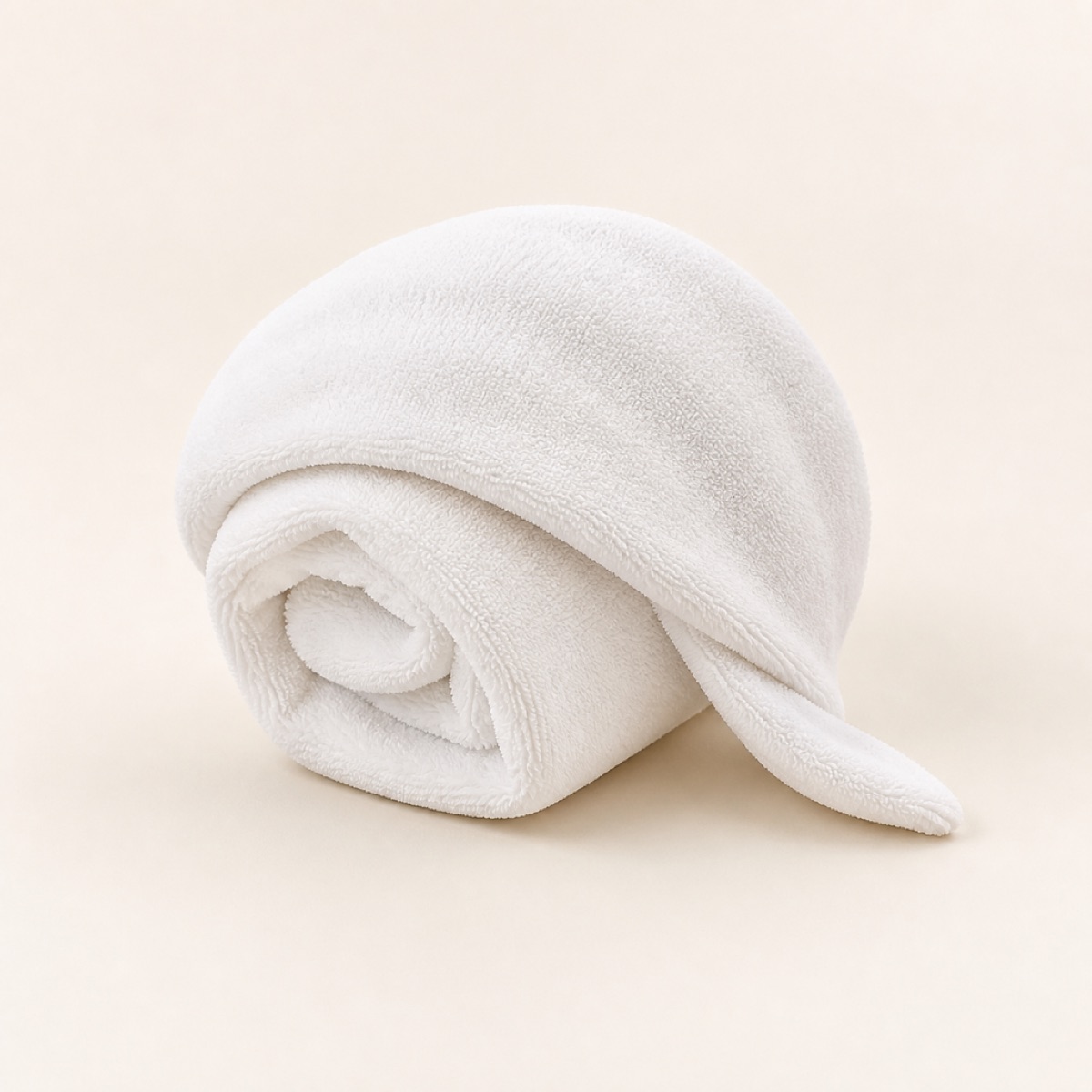 Rolled cotton hair towel wrap with a tapered end