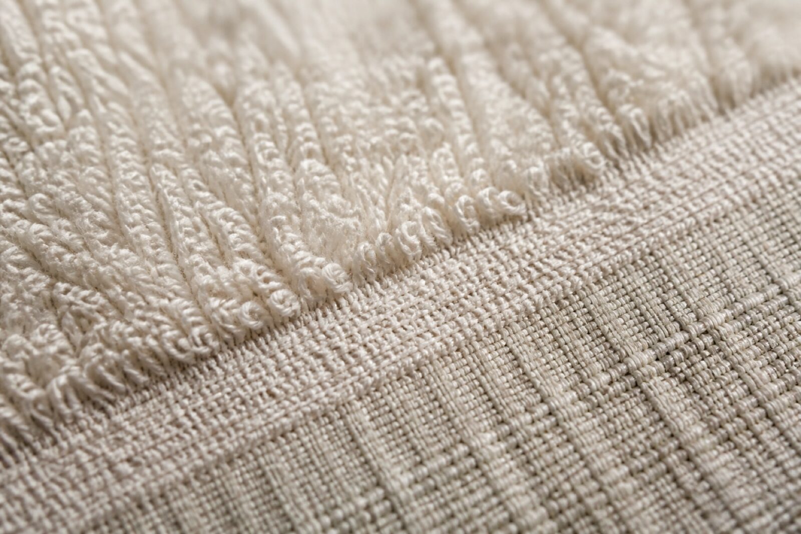 Macro of terry towelling loops and a woven dobby border