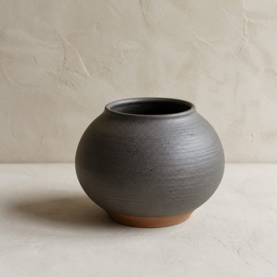 Wide round vessel in charcoal matte glaze