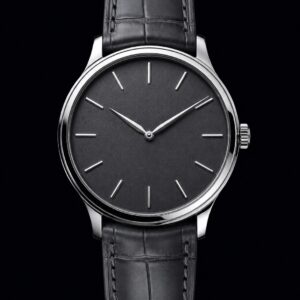 Steel dress watch with a charcoal grained dial and grey alligator strap, front view on black