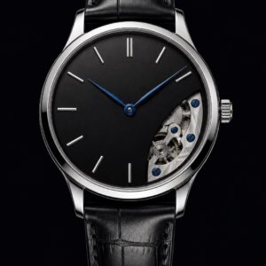 Steel dress watch with heat-blued steel hands, blue the only colour in the frame, front view on black