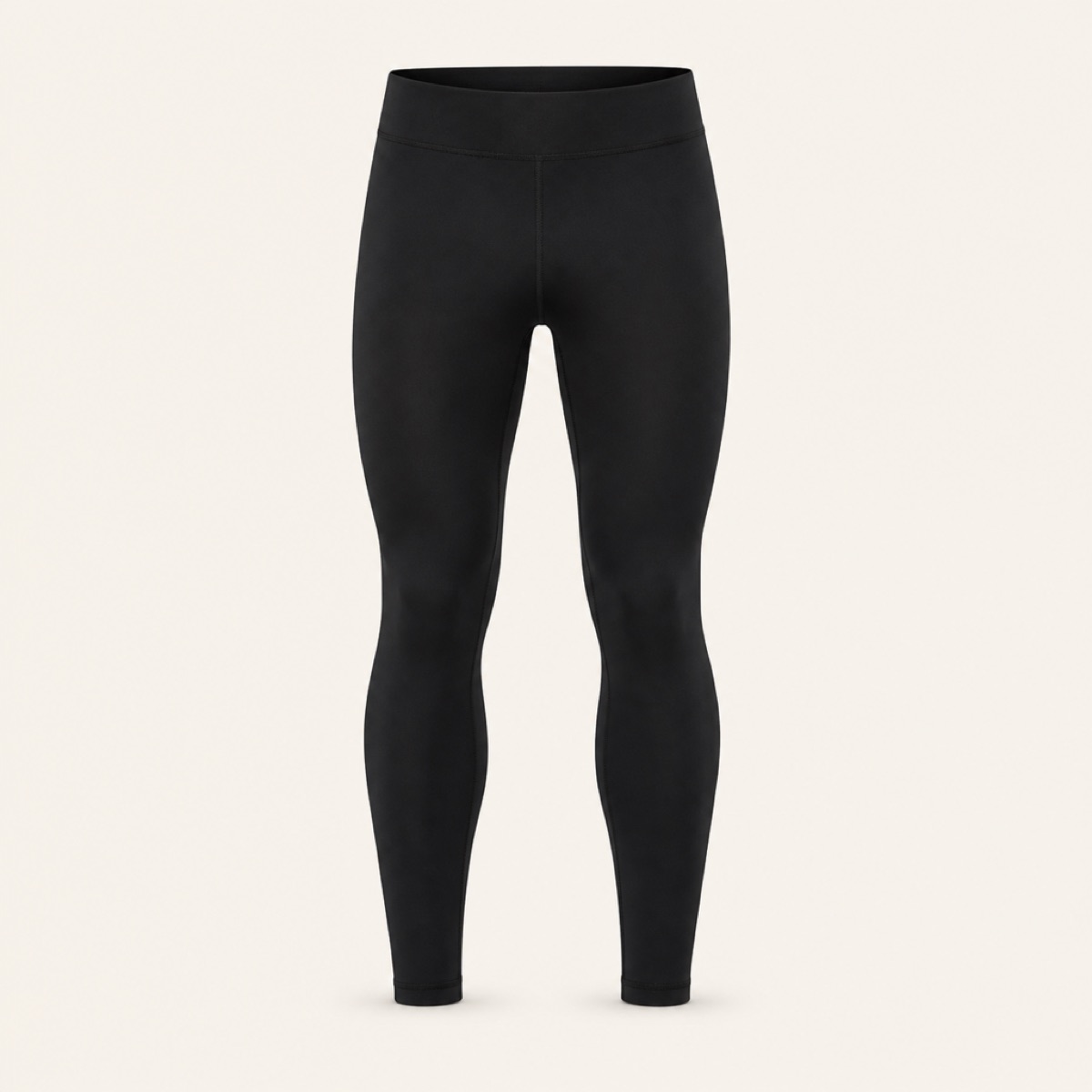 Black full-length training tight with a wide plain waistband, laid flat