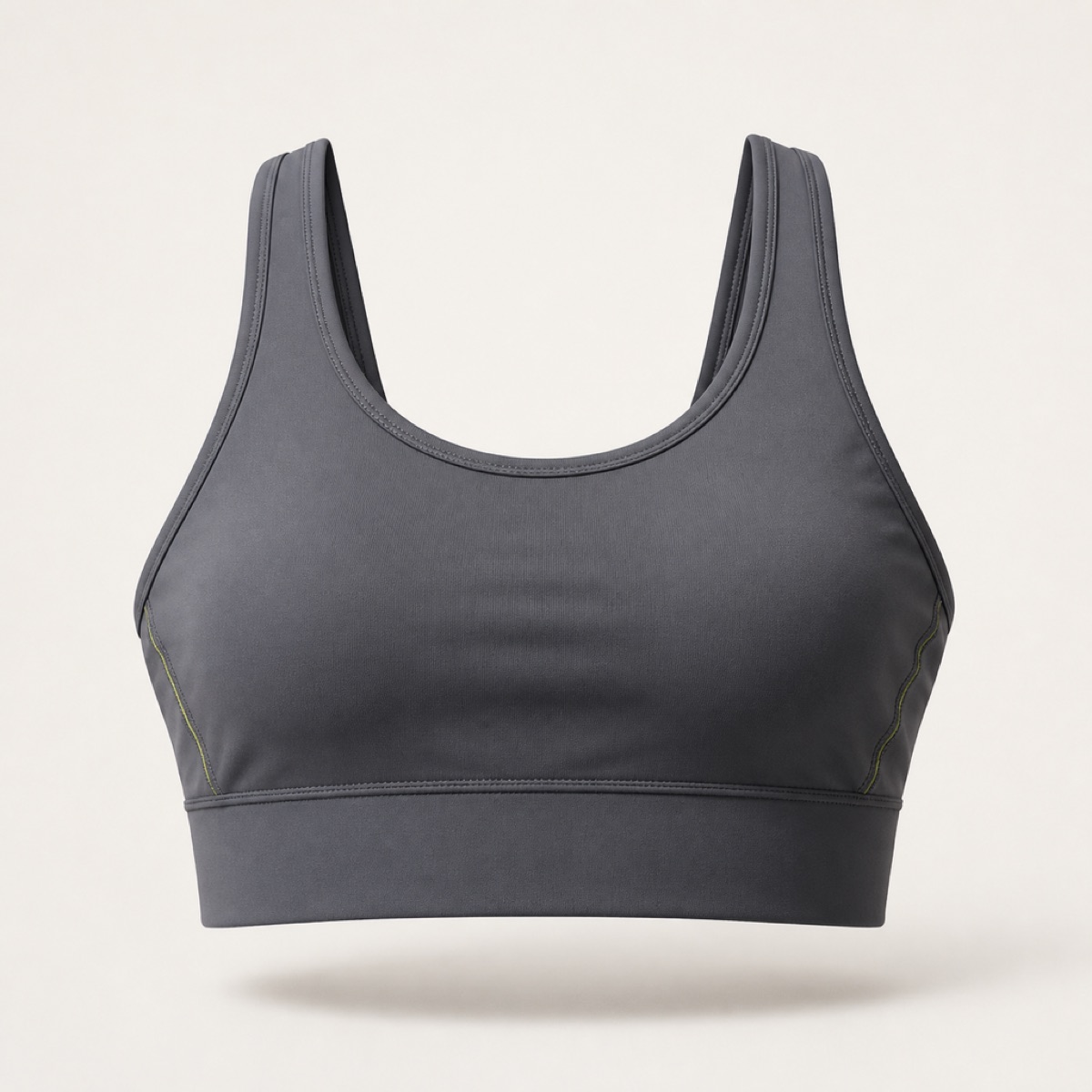 Dark grey scoop-neck sports bra with wide shoulder straps and a deep underband