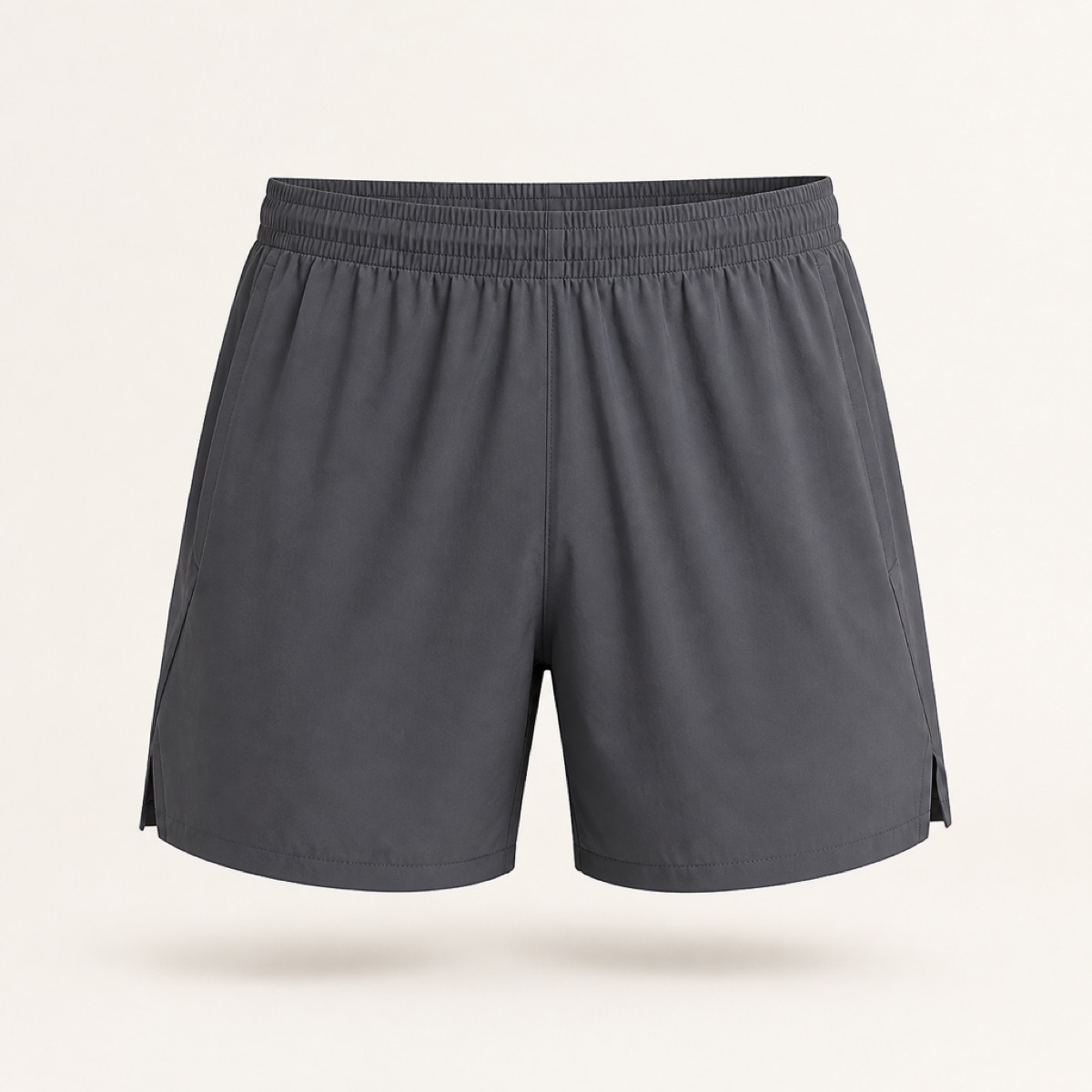 Grey five-inch woven running short with an elasticated waistband, laid flat