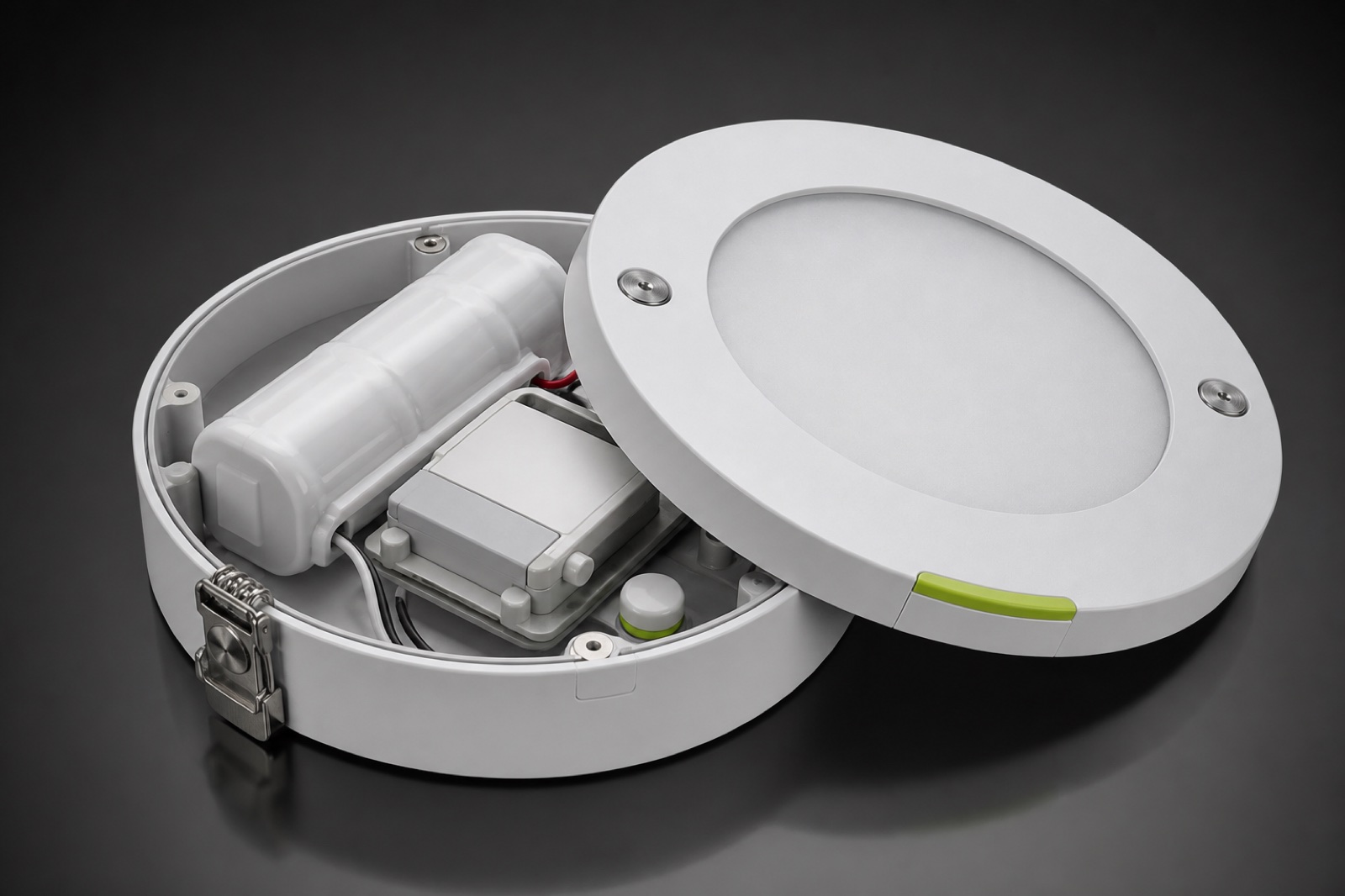 Surface emergency downlight opened for service